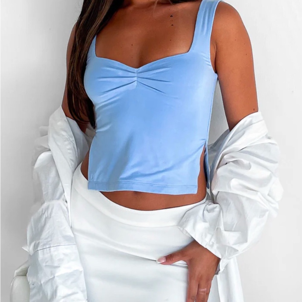 White fox “Taking Off Top” in baby blue
